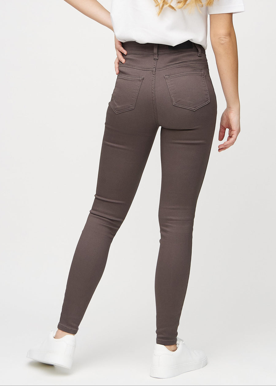 Graubraune skinny jeans von hinten gesehen, damit man das gesamte Produkt sehen kann.